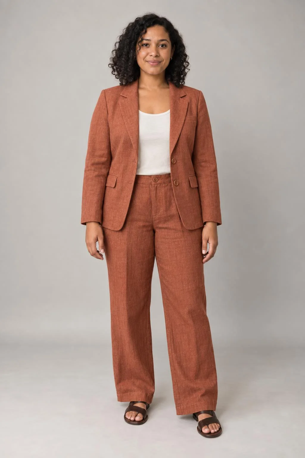 Generated example of the same person wearing the linen tailoring outfit, front view